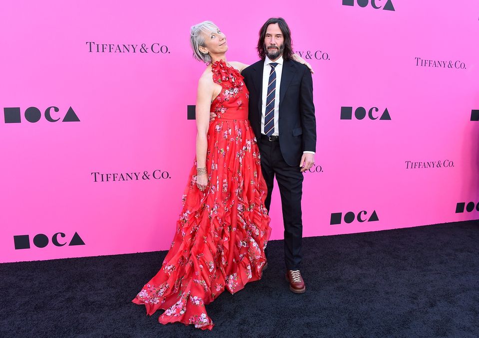 Keanu Reeves a Alexandra Grant.
